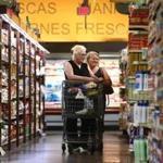Boston, MA - 8/22/2017 - Sisters Cruz Sanchez (cq), left, of Mattapan, and Frances Rosado (cq), of Dorchester, shop. Tropical Foods, in Roxbury, caters to an international community. Customers are asked about a possible food delivery service in the area. Photo by Pat Greenhouse/Globe Staff Topic: tropicalfoods Reporter: Lauren Feiner