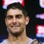 FILE - In this Thursday, Aug. 10, 2017 file photo, New England Patriots quarterback Jimmy Garoppolo speaks to the media following an NFL preseason football game against the Jacksonville Jaguars in Foxborough, Mass. On Monday, Oct. 30, 2017, the Patriots traded Garoppolo to the San Francisco 49ers for a 2018 draft pick. (AP Photo/Mary Schwalm, File)