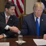 President Trump and Speaker Paul Ryan shook hands during a meeting on the GOP tax plan Thursday.