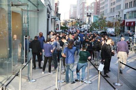 People lined up outside the Apple Store in Boston to purchase the new iPhone X.
