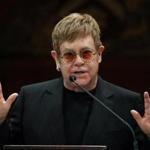 Elton John spoke to an audience of Harvard students, staff, and superfans at Sanders Theatre Monday.