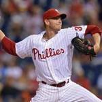 FILE - DECEMBER 9, 2013: It was reported that the Toronto Blue Jays signed a one-day deal with free-agent pitcher Roy Halladay so he can announce his retirement in a news conference with his former team December 9, 2013. PHILADELPHIA, PA - SEPTEMBER 12: Starter Roy Halladay #34 of the Philadelphia Phillies delivers a pitch in the first inning against the San Diego Padres at Citizens Bank Park on September 12, 2013 in Philadelphia, Pennsylvania. (Photo by Drew Hallowell/Getty Images)