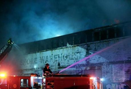 Firefighters responded to a four-alarm fire in East Boston on Saturday night.
