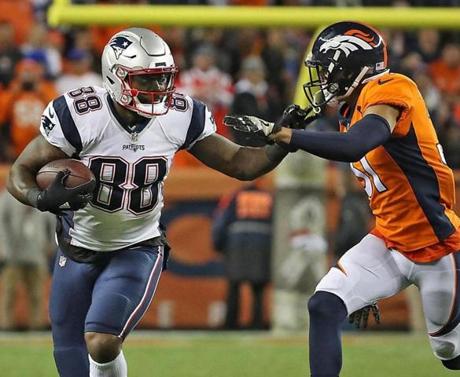 Patriots tight end Martellus Bennett eluded a Broncos defender during the first quarter.
