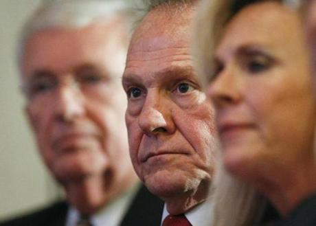 FILE - In this Thursday, Nov. 16, 2017 file photo, former Alabama Chief Justice and U.S. Senate candidate Roy Moore waits to speak at a news conference in Birmingham, Ala. (AP Photo/Brynn Anderson)
