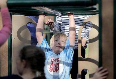 Leo Woolfenden played on the monkey bars during recess at the Bessie Buker Elementary School.
