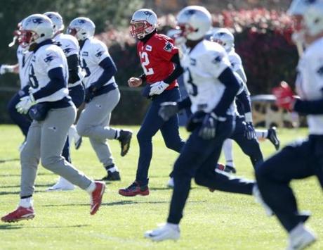 11/10/2017 Foxboro Ma New England Patriots QB #12 Tom Brady (cq) during running and stretching drills at practice. Jonathan Wiggs\Globe Staff Reporter:Topic. 
