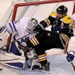 Boston, MA - 11/11/2017 - (2nd period) Boston Bruins left wing Brad Marchand (63) can't make a play before Toronto Maple Leafs goalie Curtis McElhinney (35) covers up the rebound during the second period. The Boston Bruins host the Toronto Maple Leafs in the second of a home and home game at TD Garden. - (Barry Chin/Globe Staff), Section: Sports, Reporter: Fluto Shinzawa, Topic: 12Bruins-Maple Leafs, LOID: 8.3.4290799469.