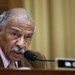 FILE- In this April 4, 2017, file photo, Rep. John Conyers, D-Mich., speaks during a hearing of the House Judiciary subcommittee on Capitol Hill in Washington. House Democratic Leader Nancy Pelosi is defending Conyers as an 