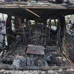Religious protesters destroyed a van in clashes with police in Islamabad. Six people were killed in the protests Saturday.