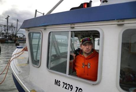 Lobsterman Tom Tomkiewicz, on his boat at Union Wharf in Fairhaven, said he is trapping in deeper, colder waters.
