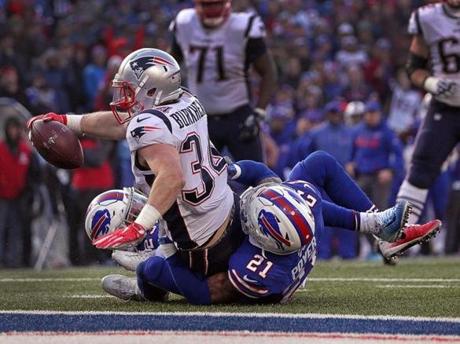 Patriots running back Rex Burkhead stretched out just far enough to get the ball across the goal line.
