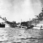 Nacy personnel inspected the capsized USS Oklahoma after the Japanese attack on Pearl Harbor in Hawaii in 1941. 