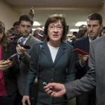 Sen. Susan Collins, R-Maine, and other senators rush to the chamber to vote on amendments as the Republican leadership works to craft their sweeping tax bill in Washington.