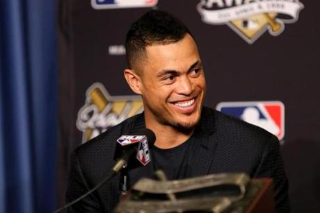 LOS ANGELES, CA - OCTOBER 25: 2017 Hank Aaron Award recipient Giancarlo Stanton #27 of the Miami Marlins attends the 2017 Hank Aaron Award press conference prior to game two of the 2017 World Series between the Houston Astros and the Los Angeles Dodgers at Dodger Stadium on October 25, 2017 in Los Angeles, California. (Photo by Tim Bradbury/Getty Images)
