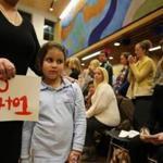 Gisel Pena and her daughter Chanelle, 5, returned to their seat after addressing the Boston School Committee at a meeting Wednesday about earlier start times for elementary and K-8 schools.