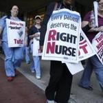 Boston, MA -- 7/17/2017 - Tufts nurses continued to picket around 6:30 this morning before heading back to work after a one day strike followed by a lockout. (Jessica Rinaldi/Globe Staff) Topic: 18nurses Reporter: