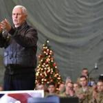 US Vice President Mike Pence speaks to troops in a hangar at Bagram Air Field in Afghanistan on December 21, 2017. POOL / AFP PHOTO / POOL / MANDEL NGANMANDEL NGAN/AFP/Getty Images