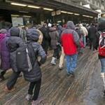 QUINCY, MA - 2/11/2015: After waiting hours for a bus, passengers would run out of line to try and get on an already full bus at Quincy Center Station. MBTA rails commutes into Boston from Braintree to JFK station by bus (David L Ryan/Globe Staff Photo) SECTION: METRO TOPIC 12snowcommute(1)