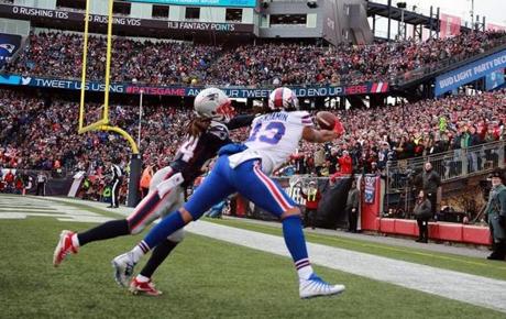 Foxborough, MA - 12/24/2017: Stephon Gilmore defends Buffalo's Kelvin Benjamin on controversial TD which was overturned during second quarter action. The New England Patriots host the Buffalo Bills at Gillette Stadium. Matthew J. Lee / Globe staff
