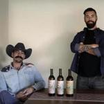 Alex Howe (right), and Chip Forsythe, the cofounders of Rebel Coast, with their cannabis-infused wine in Los Angeles. Each bottle of thier product contains 16 milligrams of THC.