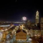 The New Year?s fireworks display in the Boston Harbor over Faneuil Hall in 2011.