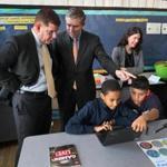 Mayor Martin J. Walsh and Boston School Committee Chairman Michael O'Neill looked over students working.