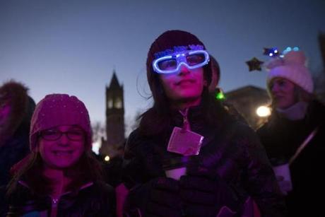10-year-old Farrah Zerola (center), and at left, Sierra Zerola, 9, watched the performance by Girls Nite Out.
