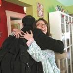 Christine Tierney and Eli Roberts were happy to see each other on Saturday at her home in Roslindale.