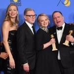 The cast of 'The Handmaid's Tale' pose with the trophy for Best Television Series - Drama during the 75th Golden Globe Awards on January 7, 2018, in Beverly Hills, California. / AFP PHOTO / Frederic J. BROWNFREDERIC J. BROWN/AFP/Getty Images
