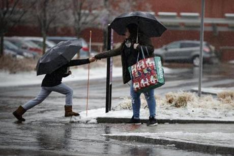 12/23/2017 - Somerville, MA - Assembly Square - Shoppers braved the freezing rain to get in some last-minute Christmas shopping on December 23, 2017. Photo by Dina Rudick/Globe Staff
