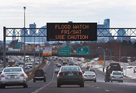 A sign warning of potential flooding this weekend appeared above Route 93 southbound.
