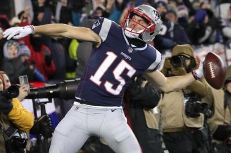 Foxborough, MA Patriots Chris Hogan threw the ball to the crowd after he made a touchdown during the second quarter. AFC Divisional Playoff game between the New England Patriots and Tennessee Titans at Gillette Stadium Saturday, Jan. 13, 2018. (Barry Chin/Globe Staff)
