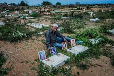 Asnaldo González of Venezuela showed the graves of his daughters and grand-daughters, who died a decade ago when a charter plane carrying cocaine crashed into their home.
