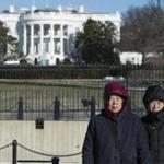 Tourists had photos taken near the White House earlier this month.