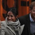 (FILES) This file photo taken on January 09, 2018 shows Britain's Prince Harry and his fiancée US actress Meghan Markle arriving for their visit to Reprezent 107.3FM community radio station in Brixton, south west London on January 9, 2018. The leader of the UK Independence Party (UKIP) faced calls to resign on January 14, 2018 after his girlfriend reportedly made racist remarks about Prince Harry's fiancee Meghan Markle. Henry Bolton, who was elected in September, said his 25-year-old partner Jo Marney had been suspended from the anti-EU, anti-immigration party after the text messages were published in the Mail on Sunday newspaper. / AFP PHOTO / Adrian DENNISADRIAN DENNIS/AFP/Getty Images