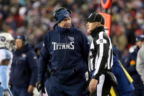 FOXBOROUGH, MA - JANUARY 13: Head coach Mike Mularkey of the Tennessee Titans reacts with the referre in the fourth quarter of the AFC Divisional Playoff game against the New England Patriots at Gillette Stadium on January 13, 2018 in Foxborough, Massachusetts. (Photo by Adam Glanzman/Getty Images)
