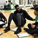 Jaylen Brown of the Celtics with Amaiya Lu and Chris Garcia at the team?s practice facility on MLK Day.