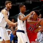 DALLAS, TX - OCTOBER 04: Jarell Eddie #31 of the Chicago Bulls controls the ball against PJ Dozier #35 of the Dallas Mavericks and Maximilian Kleber #42 of the Dallas Mavericks in the second half at American Airlines Center on October 4, 2017 in Dallas, Texas. NOTE TO USER: User expressly acknowledges and agrees that, by downloading and or using this photograph, User is consenting to the terms and conditions of the Getty Images License Agreement. (Photo by Tom Pennington/Getty Images)