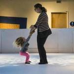 Boston, Massachusetts - 1/22/2018 - Sharon Levine spins her daughter Lea Golub-Sass(2) in their socks on a surface meant to simulate an ice skating rink at the Children's Museum in Boston, Massachusetts, January 22, 2018. (Keith Bedford/Globe Staff) 