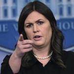 White House press secretary Sarah Huckabee Sanders speaks during the daily briefing at the White House in Washington, Wednesday, Jan. 24, 2018. Sanders was asked about the strength of the U.S. dollar, the recent school shootings and other topics. (AP Photo/Susan Walsh)