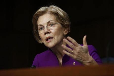 Senate Banking, Housing, and Urban Affairs Committee member Sen. Elizabeth Warren, D-Mass., questions Jerome Powell, President Donald Trump's nominee for chairman of the Federal Reserve, during a Senate Banking, Housing, and Urban Affairs Committee hearing on Capitol Hill in Washington, Tuesday, Nov. 28, 2017. (AP Photo/Carolyn Kaster)

