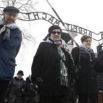 Survivors and guests entered the former Auschwitz-Birkenau concentration camp Saturday. 