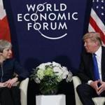 FILE - A Thursday, Jan. 25, 2018 file photo of US President Donald Trump meeting with British Prime Minister Theresa May at the World Economic Forum in Davos, Switzerland. President Donald Trump has wished Prince Harry and fiancee Meghan Markle well and says he is not aware of having received an invitation to their royal wedding in May. (AP Photo/Evan Vucci, File)