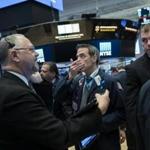 Traders worked the floor of the New York Stock Exchange Friday. 