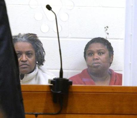 Peggy LaBossiere, 51, and her sister, Rachel Hilaire, 40, during their arraignment at Brockton District Court on Feb. 1, 2018. They were arraigned on multiple charges of assaulting two children in what police described as Haitian Voodoo rituals. (Marc Vasconcellos/Brockton Enterprise)
