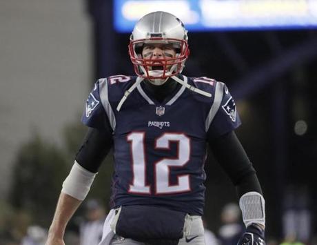 Tom Brady yelled to the crowd before a game this season.
