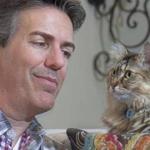 Humane Society chief executive Wayne Pacelle with his cat, Zoe, at his home in Chevy Chase, Md. 