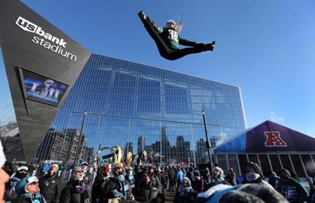 SUPER BOWL SLIDER1 Minneapolis, MN - 2/4/2018 -Eagles fan soars before the start of the Super Bowl while morale is high for fams. CAPTION. The New England Patriots play the Philadelphia Eagles in Super Bowl LII at US Bank Stadium in Minneapolis on Feb. 4, 2018. Credit Stan Grossfeld/Boston Globe---
