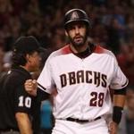 PHOENIX, AZ - SEPTEMBER 13: J.D. Martinez #28 of the Arizona Diamondbacks reacts after scoring a run against the Colorado Rockies during the fifth inning of the MLB game at Chase Field on September 13, 2017 in Phoenix, Arizona. (Photo by Christian Petersen/Getty Images)